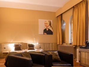 Khu vực ghế ngồi tại Hotel Monasterium PoortAckere Ghent