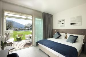 Giường trong phòng chung tại Seven Park Hotel Lake Como - Adults Only