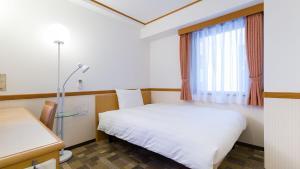 Toyoko Inn Tokushima eki Bizan guchi房間的床