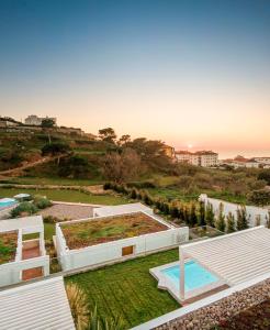 an aerial view of a house with a garden at Ericeira Prime Villas in Ericeira