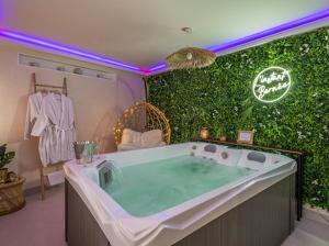 Foto sihtkohas Liancourt asuva majutusasutuse L'instant Bornéo Superbe appartement avec jacuzzi galeriist