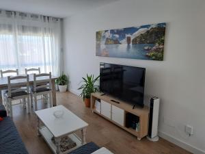 Khu vực ghế ngồi tại Apartamento Calvarios