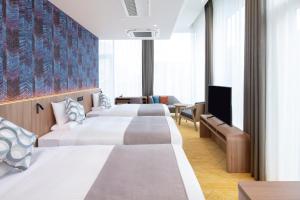 Krevet ili kreveti u jedinici u okviru objekta HOTEL MYSTAYS Nishi Shinjuku