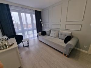 Кът за сядане в 89 - Apartamenty Siedlce - Nowy apartament przy ul. Rakowieckiej