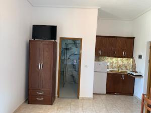 A kitchen or kitchenette at Vila Elite