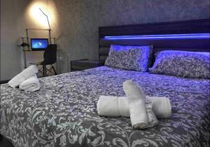 Katil atau katil-katil dalam bilik di Cozy and Luxury appartment