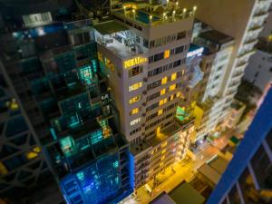 an overhead view of a tall building with lights on at Dubai Nha Trang Hotel managed by HT in Nha Trang