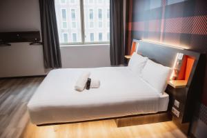 Voodi või voodid majutusasutuse easyHotel Paris Nord Aubervilliers toas