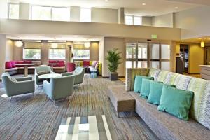 a lobby with a couch and chairs and tables at Residence Inn by Marriott Chicago Wilmette/Skokie in Wilmette