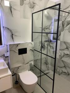 A bathroom at Vila Elite