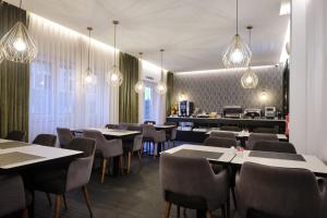 Duplo Charme Boutique Hotel 레스토랑 또는 맛집