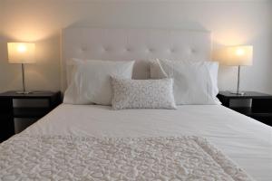 A bed or beds in a room at Casa Da Padeira - Turismo Rural