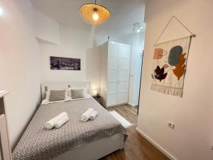 Postel nebo postele na pokoji v ubytování Apartment 42 - City Center