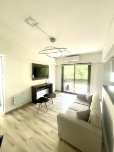 TV at/o entertainment center sa Golf Tower Suites & Apartments