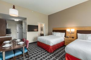 Кровать или кровати в номере TownePlace Suites by Marriott Owensboro