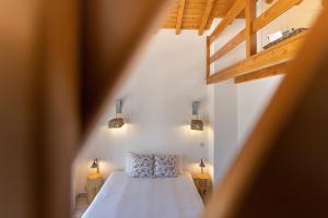 Llit o llits en una habitació de Mood Lodging - Óbidos