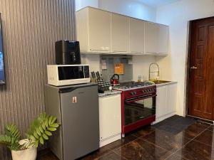 Una cocina o kitchenette en Vitasolo Hometel & Suite