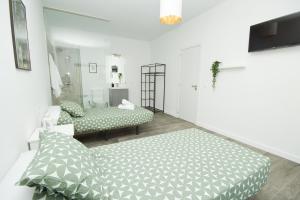 Katil atau katil-katil dalam bilik di Los Alonsos - Open Mall - By AZ Rentals