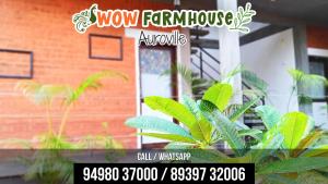 Un jardín fuera de Wow Farm House & Resort near Pondicherry