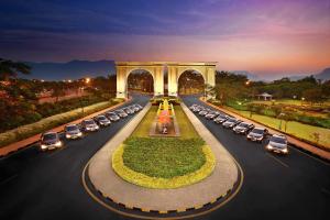 an aerial view of a road with a lot of cars at Aamby Valley City in Lonavala