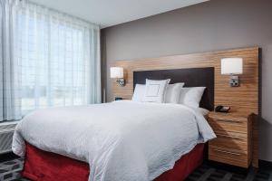 Llit o llits en una habitació de TownePlace Suites by Marriott Austin Parmer/Tech Ridge