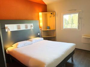 Ліжко або ліжка в номері ibis budget Carcassonne La Cité