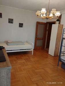 Un pat sau paturi într-o cameră la Graz-Apartments 01