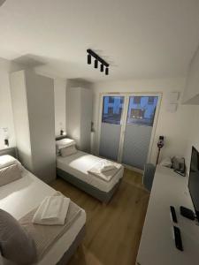 En eller flere senger på et rom på APARTAMENT 4 bed 2 room WARSAW