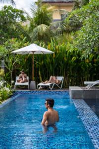 Swimming pool sa o malapit sa AmantraNa Canggu