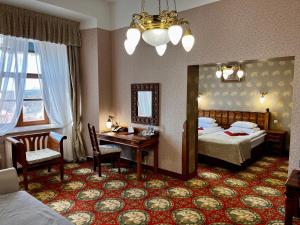 Кровать или кровати в номере Hotel Zamek Ryn