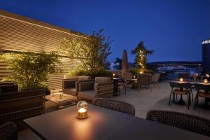 A balcony or terrace at Adina Apartment Hotel Stuttgart