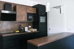 Una cocina o kitchenette en Point Zero