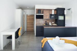 Una cocina o kitchenette en Point Zero