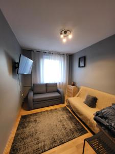 Zona d'estar a Apartament Julia Łeba