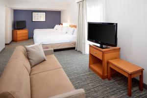 A television and/or entertainment centre at Residence Inn Lexington North