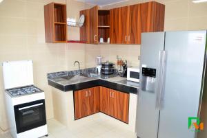 Kitchen o kitchenette sa RESIDENCES MICKEL