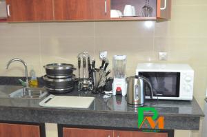 Kitchen o kitchenette sa RESIDENCES MICKEL