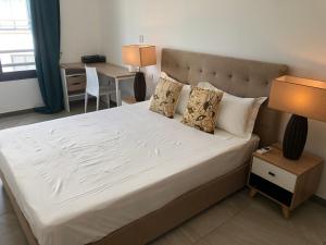 Krevet ili kreveti u jedinici u objektu Villalina : Cosy, piscine privée, proche Grand Baie et plages