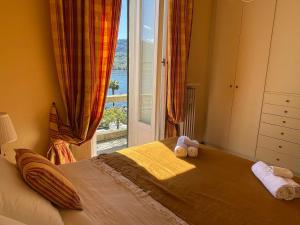 Krevet ili kreveti u jedinici u okviru objekta BELLE ILE LAKE VIEW SUITE