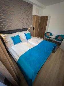 Posteľ alebo postele v izbe v ubytovaní Boutique Apartments Old Town