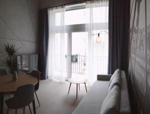 Телевизия и/или развлекателен център в Wroclove Airport Loft