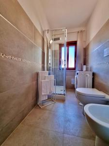 a bathroom with two sinks and a shower at Acquamarina in Gaeta