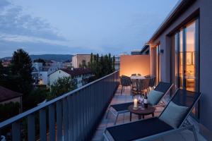 Un balcón o terraza en Acasa Suites