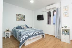 Cama ou camas em um quarto em Ampuries Delta Apartment