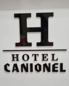 Et logo, certifikat, skilt eller en pris der bliver vist frem på Hotel Canionel