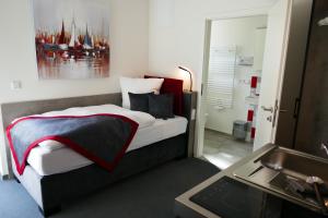 Tempat tidur dalam kamar di Hotel Gasthof Handewitt