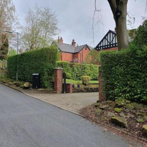 Um jardim em ChurstonBnB, private flat within family home, Bolton