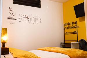 מיטה או מיטות בחדר ב-Lobo Hostel La Paz