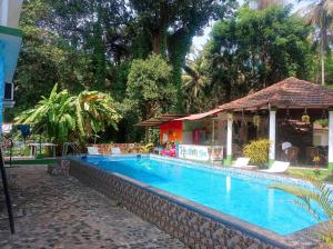 Фотография из галереи Heaven Goa Guesthouse в Бенаулиме