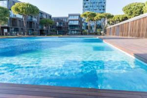 A piscina localizada em Merville 15 piano ou nos arredores